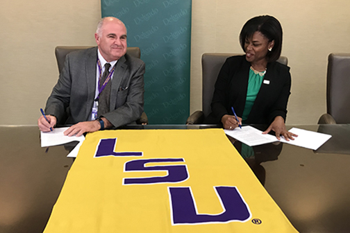 signing LSU Health New Orleans - Delgado nursing agreement